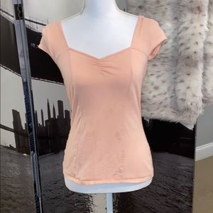 Peach shirt from Venus. Slightly off shoulders